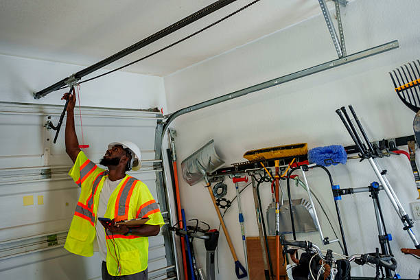Professional Garage Door Panel Replacement technician working in Logan County County, KS